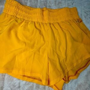 DSG Women's Vibrant Yellowish Orange Stride High-Rise Athletic Shorts
